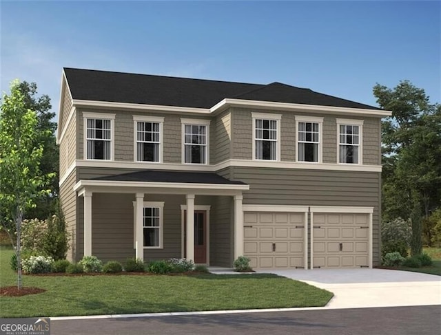 view of front of home featuring a garage and a front lawn