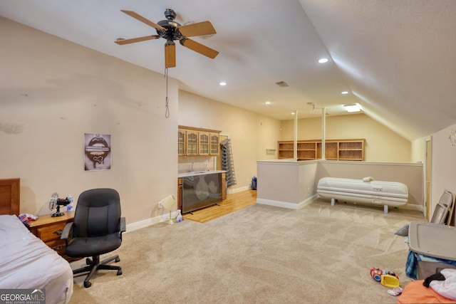 carpeted bedroom featuring ceiling fan and lofted ceiling