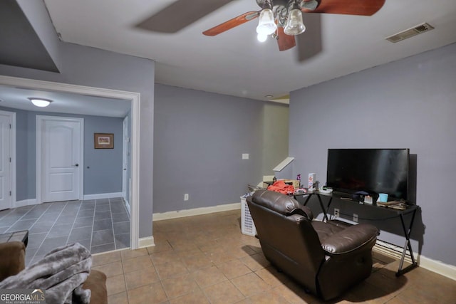 living room with tile patterned floors