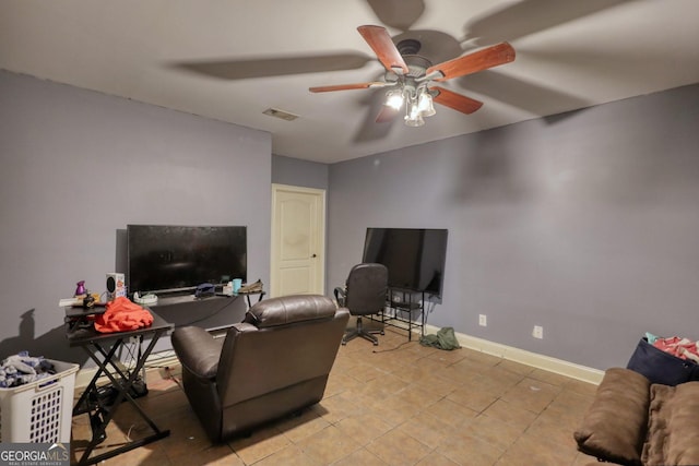 living room with ceiling fan