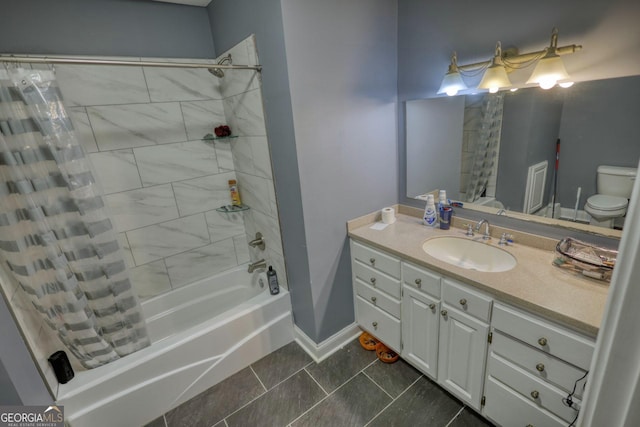 full bathroom featuring tile patterned flooring, vanity, toilet, and shower / bath combo with shower curtain