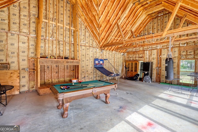 rec room featuring high vaulted ceiling and pool table