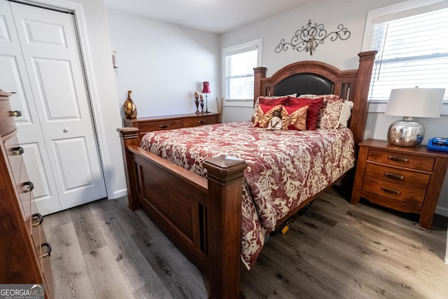 bedroom with wood finished floors