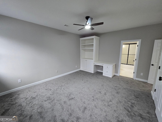 unfurnished bedroom featuring carpet flooring and ceiling fan