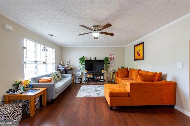 living room featuring a textured ceiling, dark hardwood / wood-style floors, ceiling fan, and ornamental molding