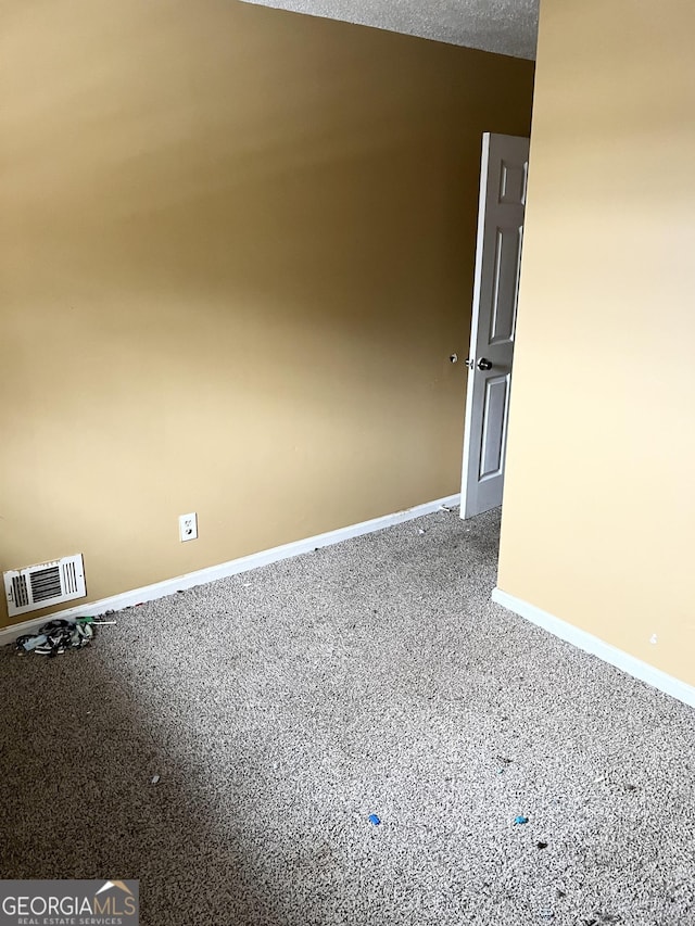 6354 Shannon Pkwy Unit 30D, Union City, GA 30291 - unfurnished room with a textured ceiling