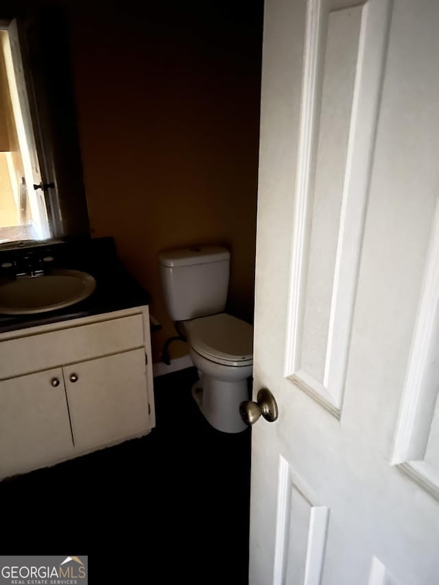 6354 Shannon Pkwy Unit 30D, Union City, GA 30291 - bathroom with vanity and toilet