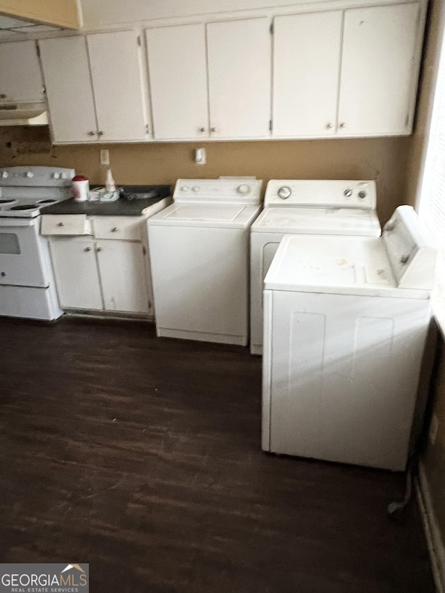 6354 Shannon Pkwy Unit 30D, Union City, GA 30291 - clothes washing area with washing machine and clothes dryer and dark hardwood / wood-style floors