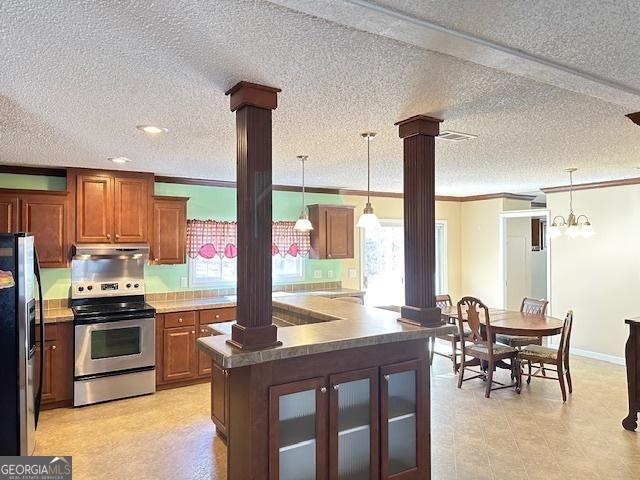 kitchen with stainless steel electric range oven, hanging light fixtures, black refrigerator with ice dispenser, and decorative columns