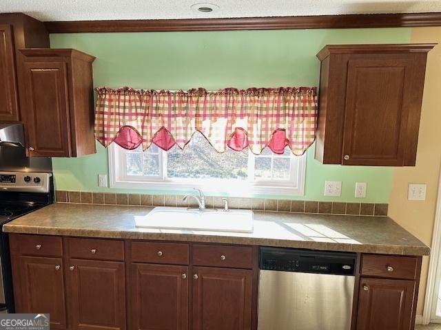 kitchen featuring sink and appliances with stainless steel finishes