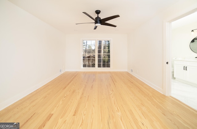 dining space featuring light hardwood / wood-style floors and an inviting chandelier