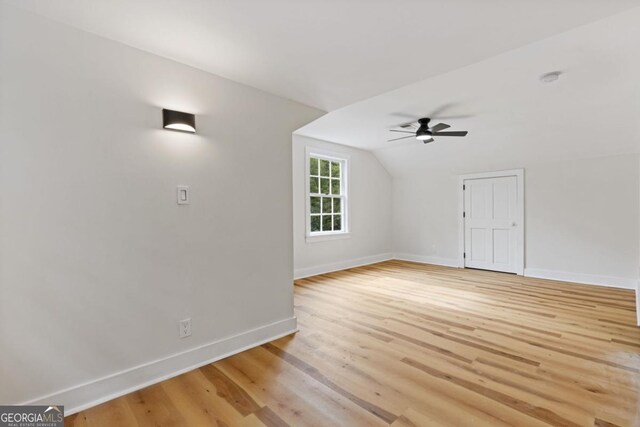 unfurnished bedroom with ceiling fan and light wood-type flooring