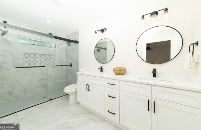 kitchen featuring wall chimney exhaust hood, a kitchen island, white cabinetry, and stainless steel appliances