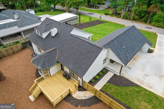 rear view of property with cooling unit and a deck