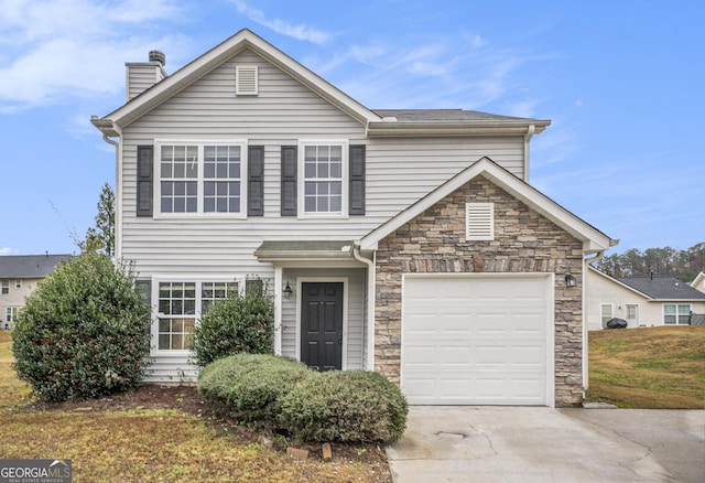 view of front of home with a garage