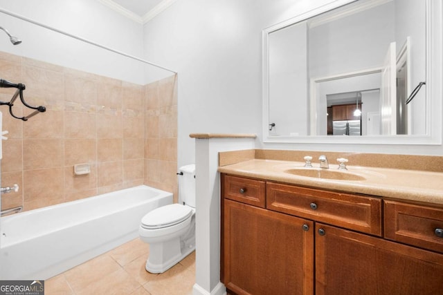 full bathroom featuring vanity, crown molding, tiled shower / bath, tile patterned flooring, and toilet