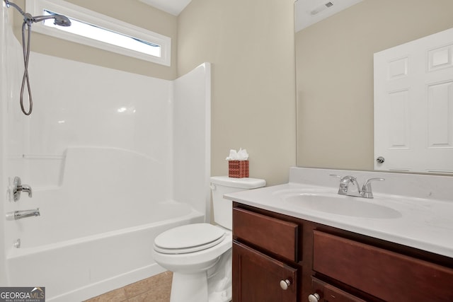 full bathroom featuring tile patterned floors, vanity, toilet, and bathing tub / shower combination