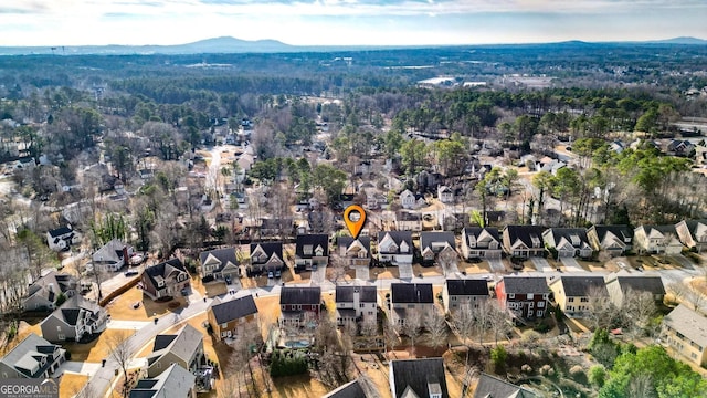 drone / aerial view featuring a mountain view