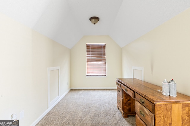 bonus room featuring lofted ceiling, baseboards, and light colored carpet