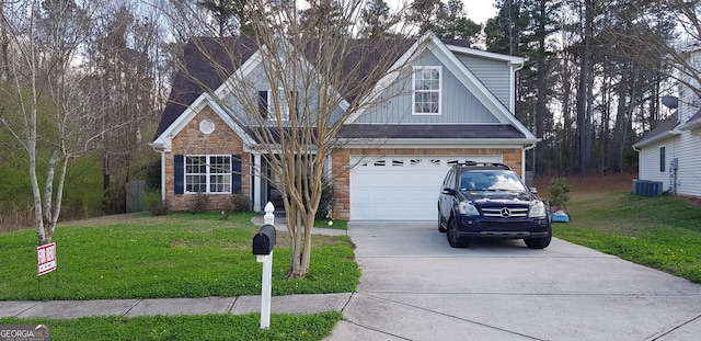 view of front of home featuring a garage, central air condition unit, and a front lawn