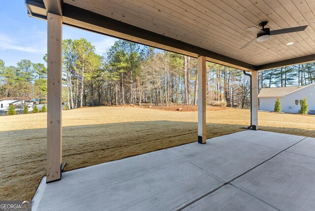 view of patio featuring ceiling fan