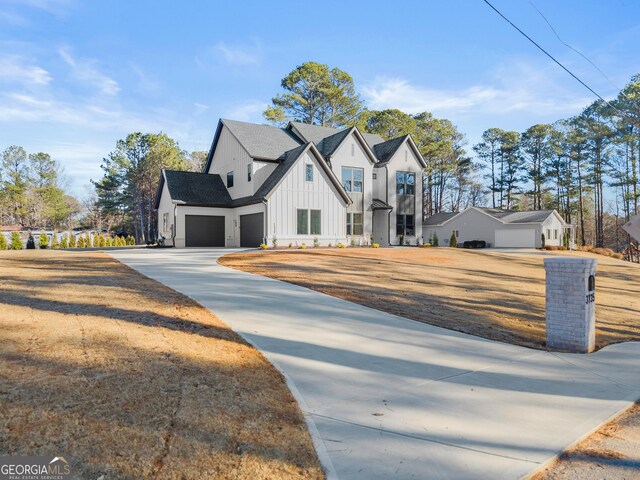 modern farmhouse style home with a garage