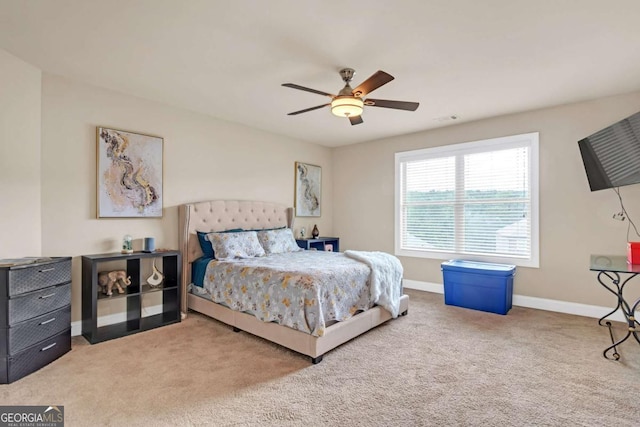 bedroom featuring carpet and ceiling fan