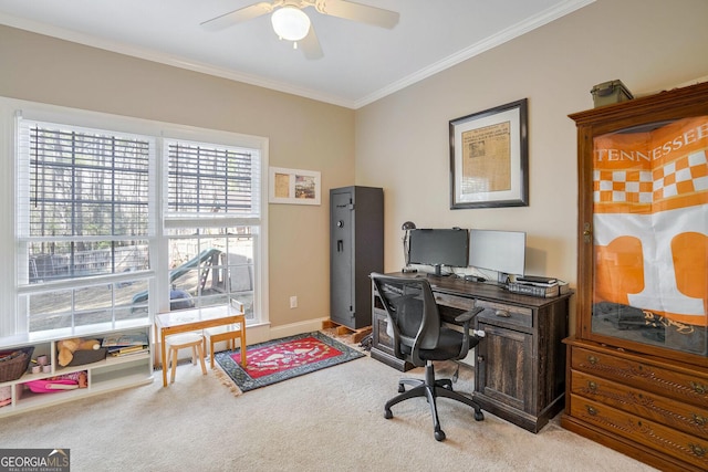 home office with light carpet, ceiling fan, and crown molding