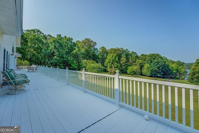 deck featuring a yard