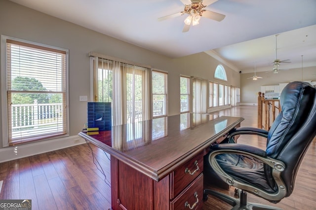 home office featuring wood-type flooring, ceiling fan, and ornamental molding