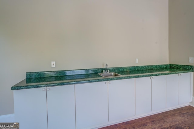 bathroom featuring hardwood / wood-style floors and sink