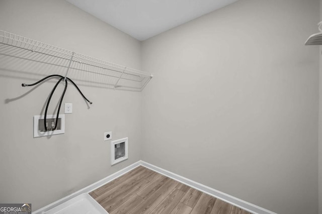 laundry room featuring hardwood / wood-style floors, electric dryer hookup, and hookup for a washing machine