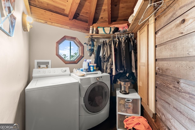 laundry area with washer and clothes dryer and wooden ceiling