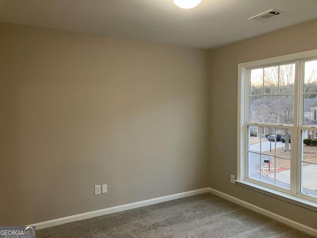 681 Courageous Ct, Lawrenceville, GA 30043 - spare room with carpet and plenty of natural light