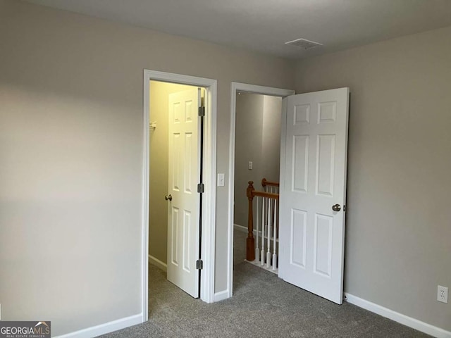 681 Courageous Ct, Lawrenceville, GA 30043 - unfurnished bedroom featuring carpet and baseboards
