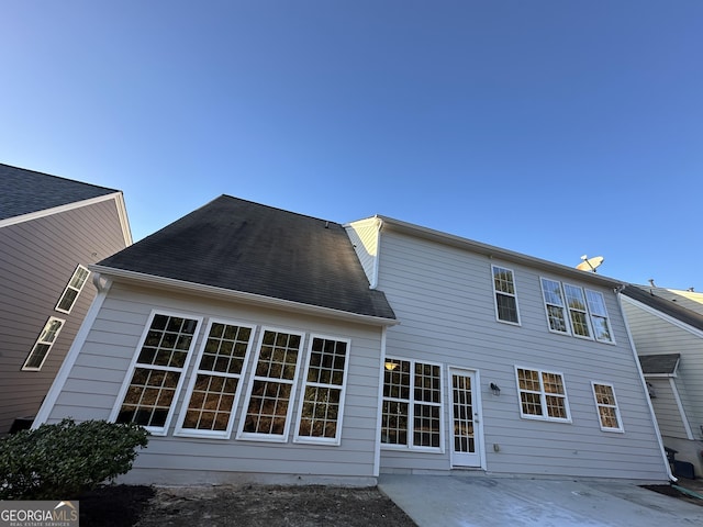 rear view of property with a patio area