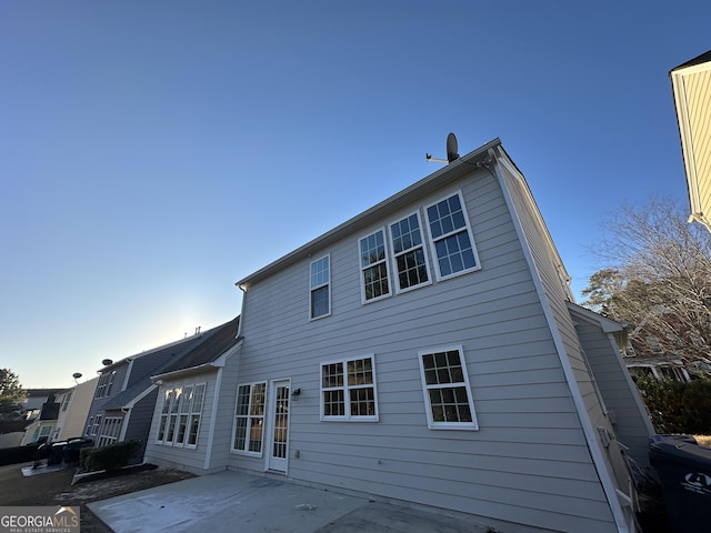 back of house with a patio area