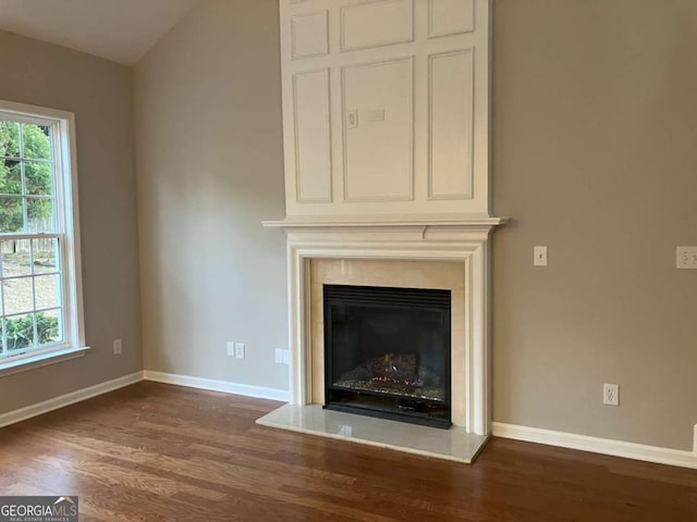 681 Courageous Ct, Lawrenceville, GA 30043 - detailed view of wood finished floors and a glass covered fireplace