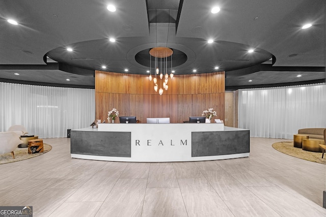 reception area with an inviting chandelier