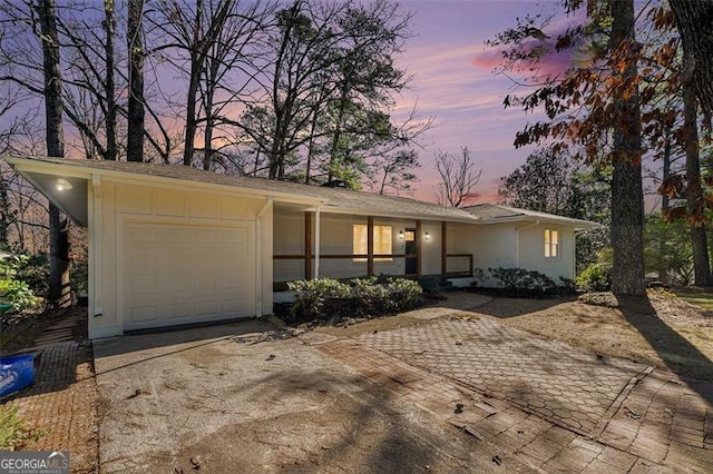 single story home featuring a garage