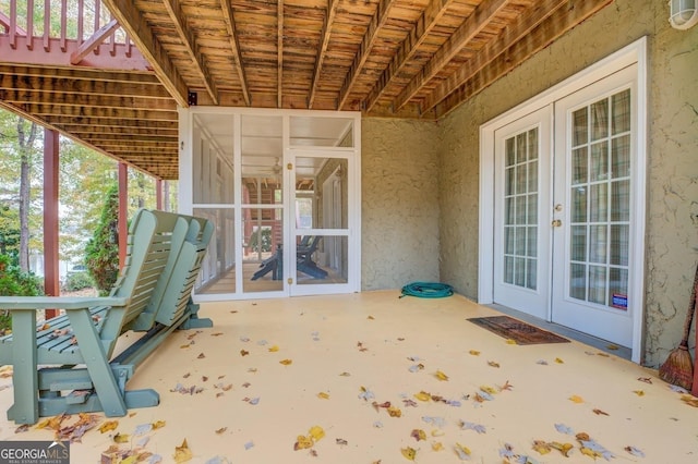 view of patio featuring french doors