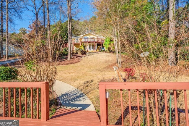 view of yard featuring a deck