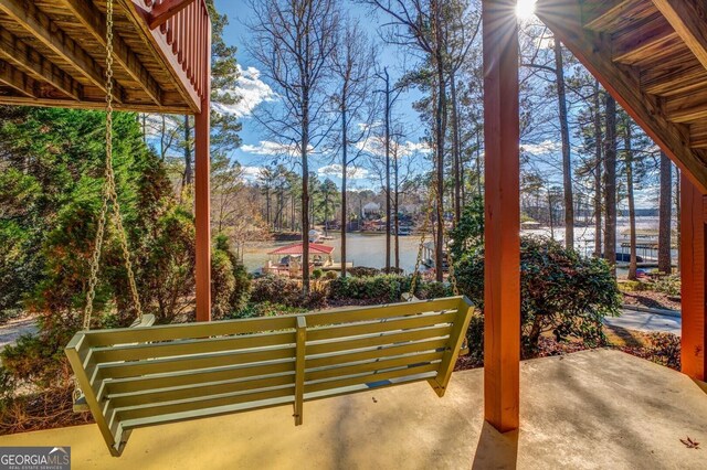 view of patio / terrace featuring a water view