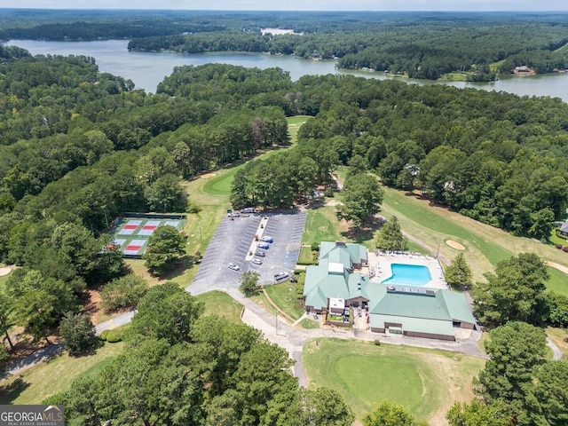 bird's eye view featuring a water view and a forest view