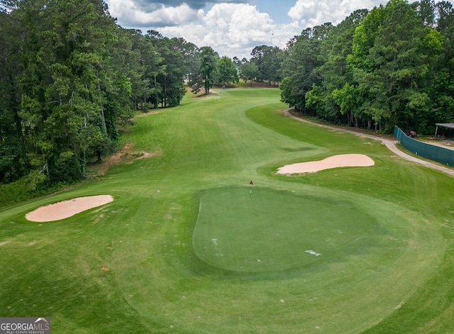 view of home's community with golf course view