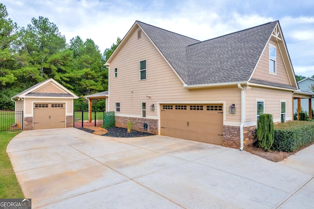 view of side of home with a garage