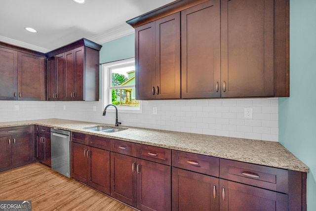 kitchen with sink, tasteful backsplash, light hardwood / wood-style flooring, stainless steel dishwasher, and ornamental molding