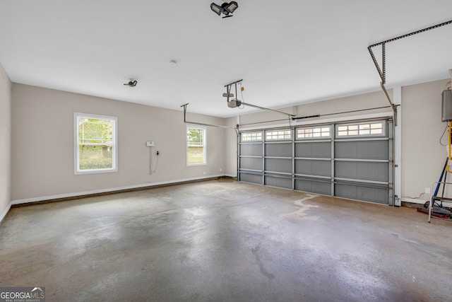 garage featuring a garage door opener