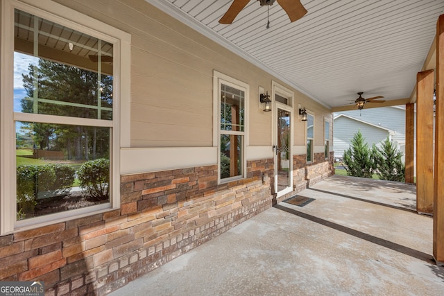 view of patio / terrace with ceiling fan and a porch