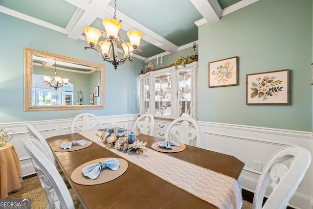 dining area featuring beamed ceiling, crown molding, a notable chandelier, and coffered ceiling